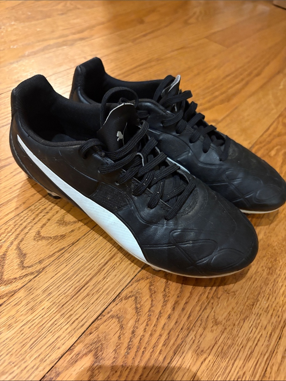Puma Kid’s Black and White Soccer Cleats